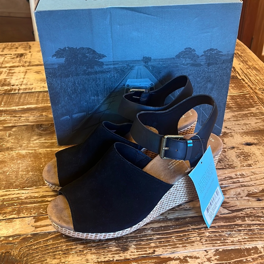 NWT and in box Tom’s Tropez peep-toe black suede wedge sandals, size 9.5